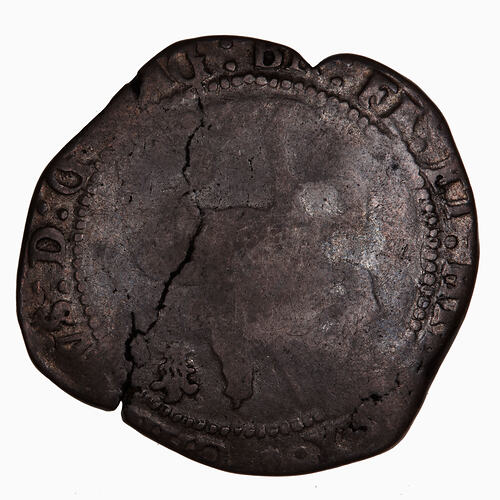 Coin, round, within a circle of beads, crowned King wearing armour and a long scarf, holding sword upright.
