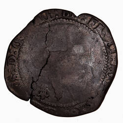 Coin, round, within a circle of beads, crowned King wearing armour and a long scarf, holding sword upright.