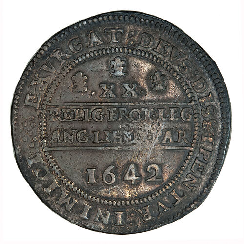 Coin, round, within a beaded circle, three plumes above the Roman numeral XX, text below.