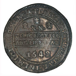 Coin, round, within a beaded circle, three plumes above the Roman numeral XX, text below.