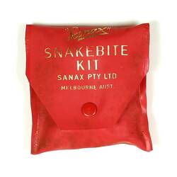 Red plastic pouch containing "Sanax snakebite kit".