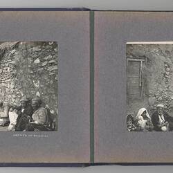 Two photos, villagers sitting against the drystone wall of a building with a thatched roof.