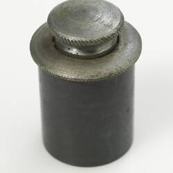 Cylindrical pewter oil bottle with heavy set screw lid.