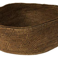 Side view of woven basket.