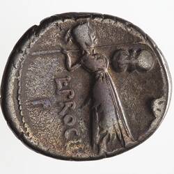 Round coin, aged, figure facing right, holding shield in one hand, with spear in other hand held out in front.