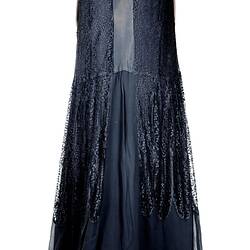 Sleeveless evening dress of black chiffon and lace.