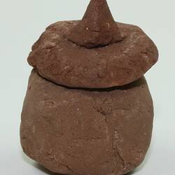 Toy tagine made from clay, side view.