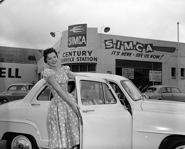 Century Service Station, Woman Posed with Car, Richmond, Victoria, 30 May 1959
