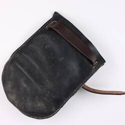 Leather pocket with buckle fastener around opening at top.
