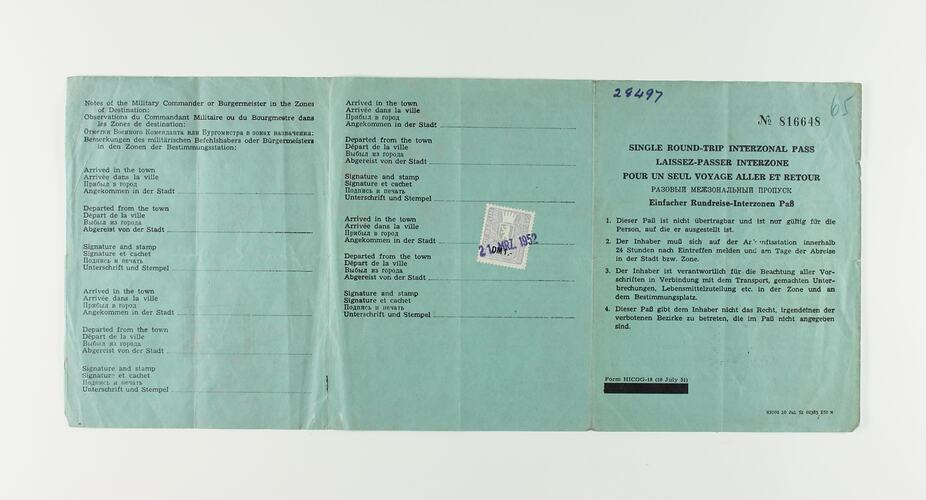 Green paper with five vertical creases, with printed text.