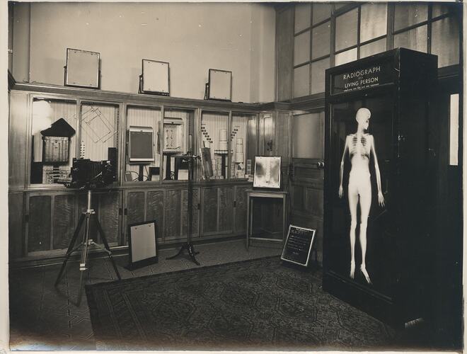 Display of x-ray products and images in room.
