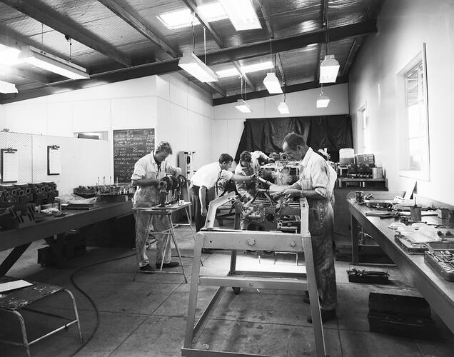 Monochrome image of aircraft mechanics.