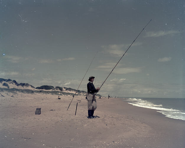Colour transparency of a man fishing.