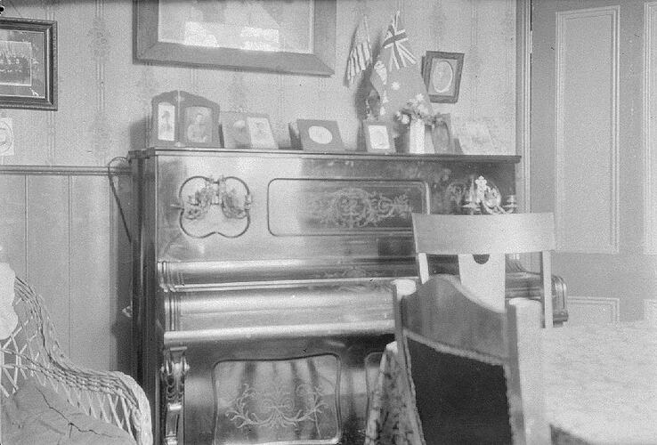 Monochrome negative of a piano.