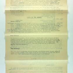 Back of typed sheet of off-white paper