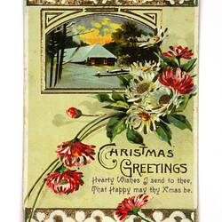 Front of card with flowers and house in snow.