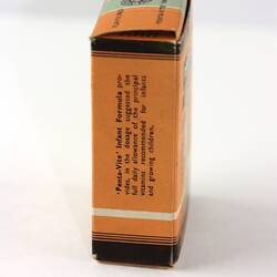 Cardboard box printed in orange, brown and white.