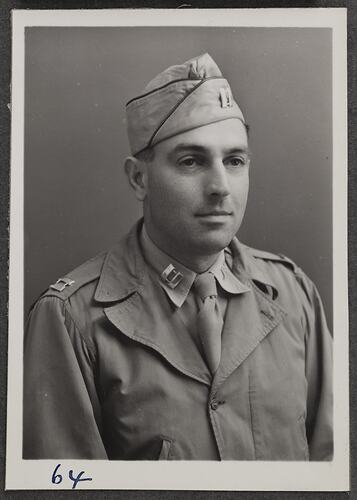 Studio portrait of man in military uniform.