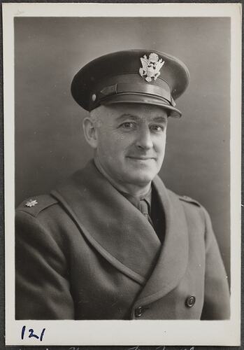 Studio portrait of man in military uniform.