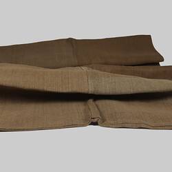 Partially folded paillasse with camera distortion.