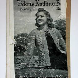 Knitting book back cover with woman wearing knitted cardigan.