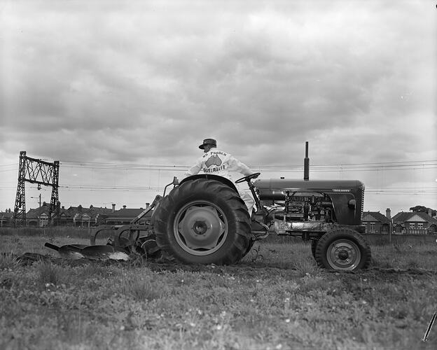 Man Ploughing Field with Tractor, Albert Park, Victoria, Sep 1958