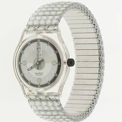 Silver wristwatch with quartered manual clock face and gridded band.