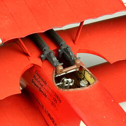 Red aeroplane model. Cockpit detail.