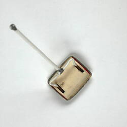 Plastic toy carpet sweeper, top view.