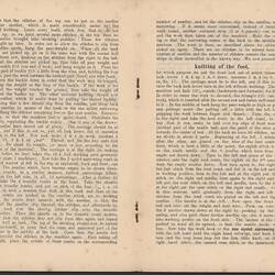 Open booklet with off-white pages and black printed text.