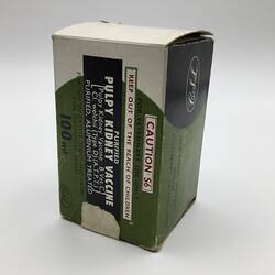 Green, black and white box. Red, white and black text on front.