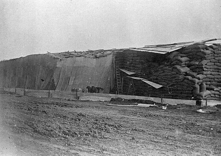 [Wheat stacks, Underbool Station, circa 1925.]