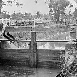 Negative - Young Boy Fishing From the Gates on an Irrigation Channel, Merrigum, Victoria, 1910