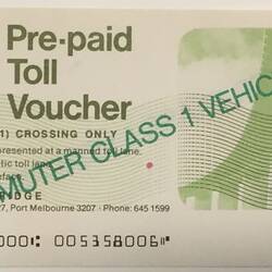 White rectangular paper voucher with green and black printing.