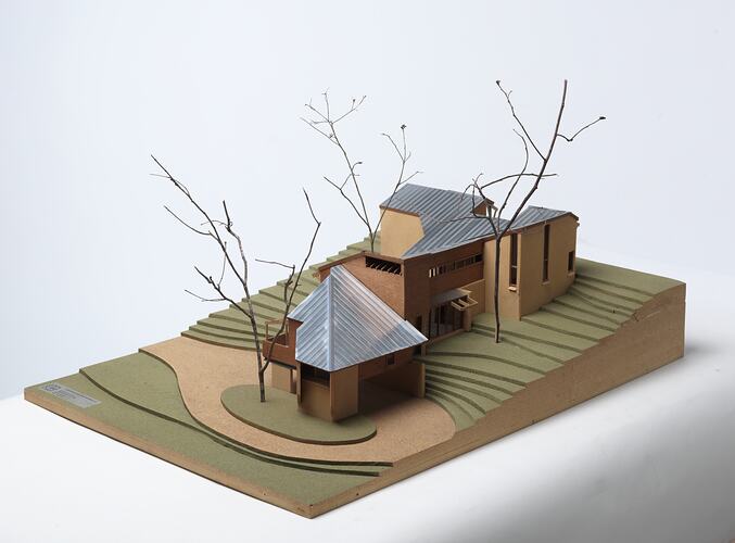 Cork and timber model of brick and timber 5 level house on steep slope. Twigs used as trees. Right corner view