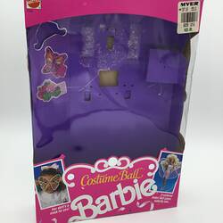 Empty pink and purple barbie doll box.