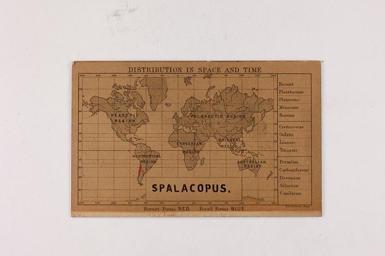 Retangular brown card with black and red text and map