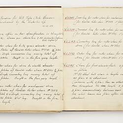 Open book with off white ruled pages. Handwritten text.
