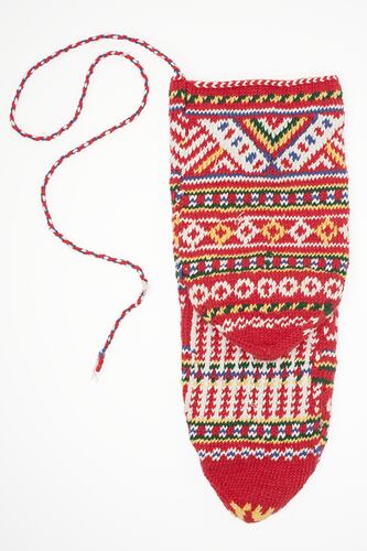 Patterned sock, predominantly red, string attached at top.