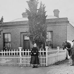 Negative - Man & Girl in Front of Brick House, Horsham (?), Victoria, circa 1885