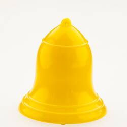 Small, bright yellow, plastic bell.