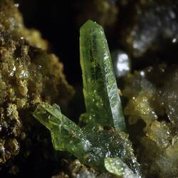 Blocky green crystal rod.