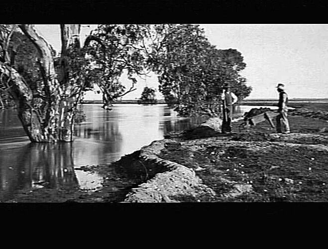 UNKNOWN - MEN MAKING LEVEE BANKS