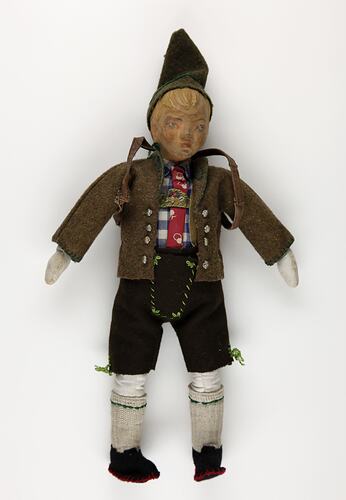 Boy doll made of wood and cloth.