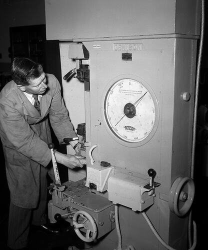 Man Operating Denison Industrial Machine, Melbourne, Victoria, 1956