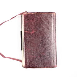 Diary with red cover.