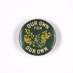 Badge with green background, green plant branch with yellow flowers and white writing above and below.