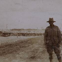 Photograph - Soldier with Vehicles & Camp in Background, Egypt, World War I, 1915-1916