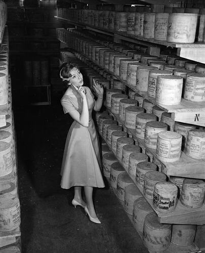 K. L. Ballantyne, Woman with Cheese Barrels, Port Melbourne, 09 Sep 1959