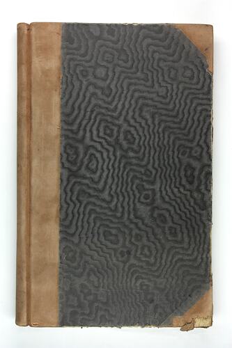 Book with brown leather spine.